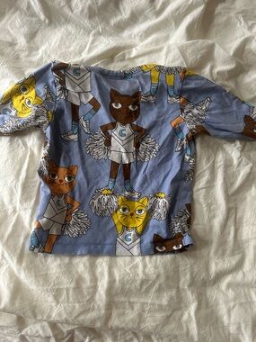 Mini Rodini Blue Cheerleader Cat Print Top with Yellow and Brown Accents